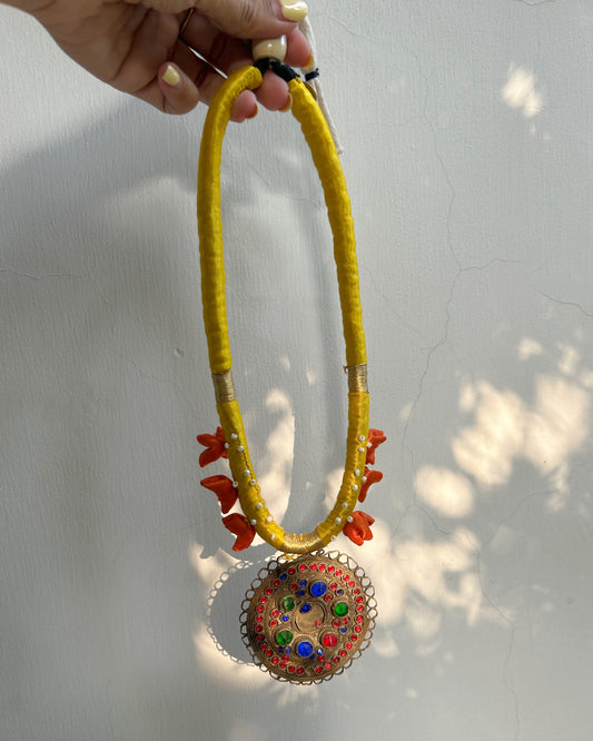 Circle Afghan statement necklace - yellow cord