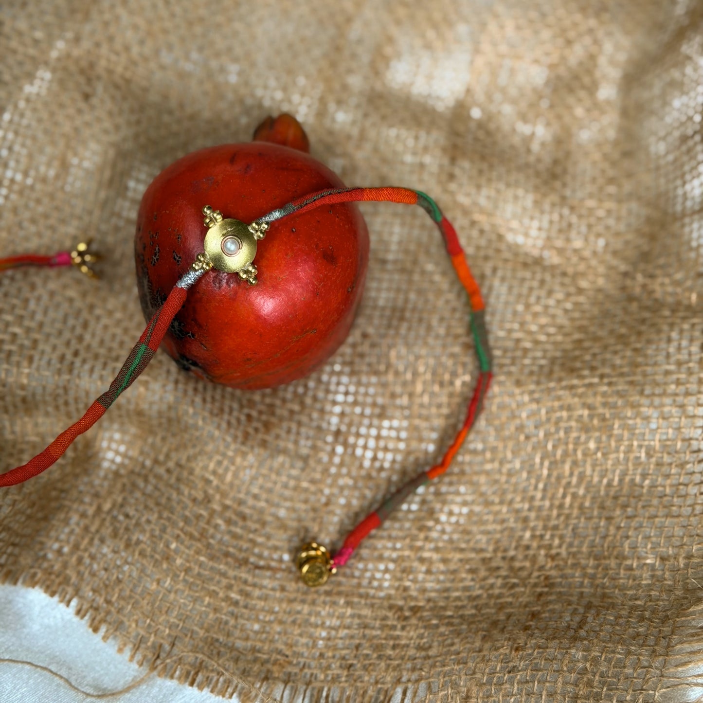 Pearl brass rakhi