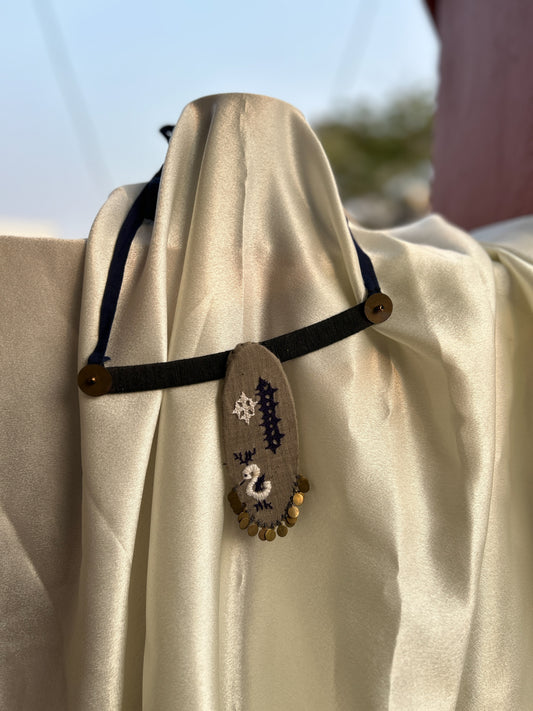 Oval embroidered grey necklace