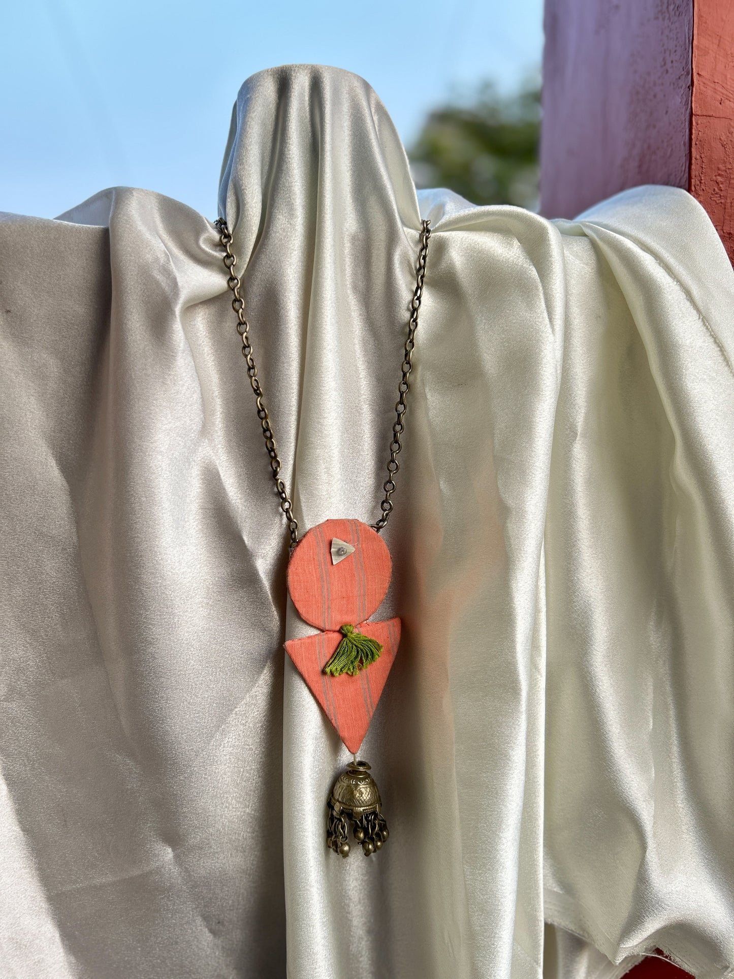 Aakar orange green tassle necklace