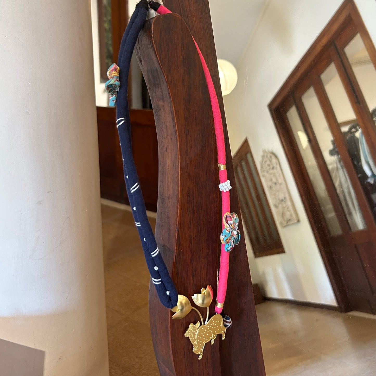 Pichwai inspired brass textile necklace