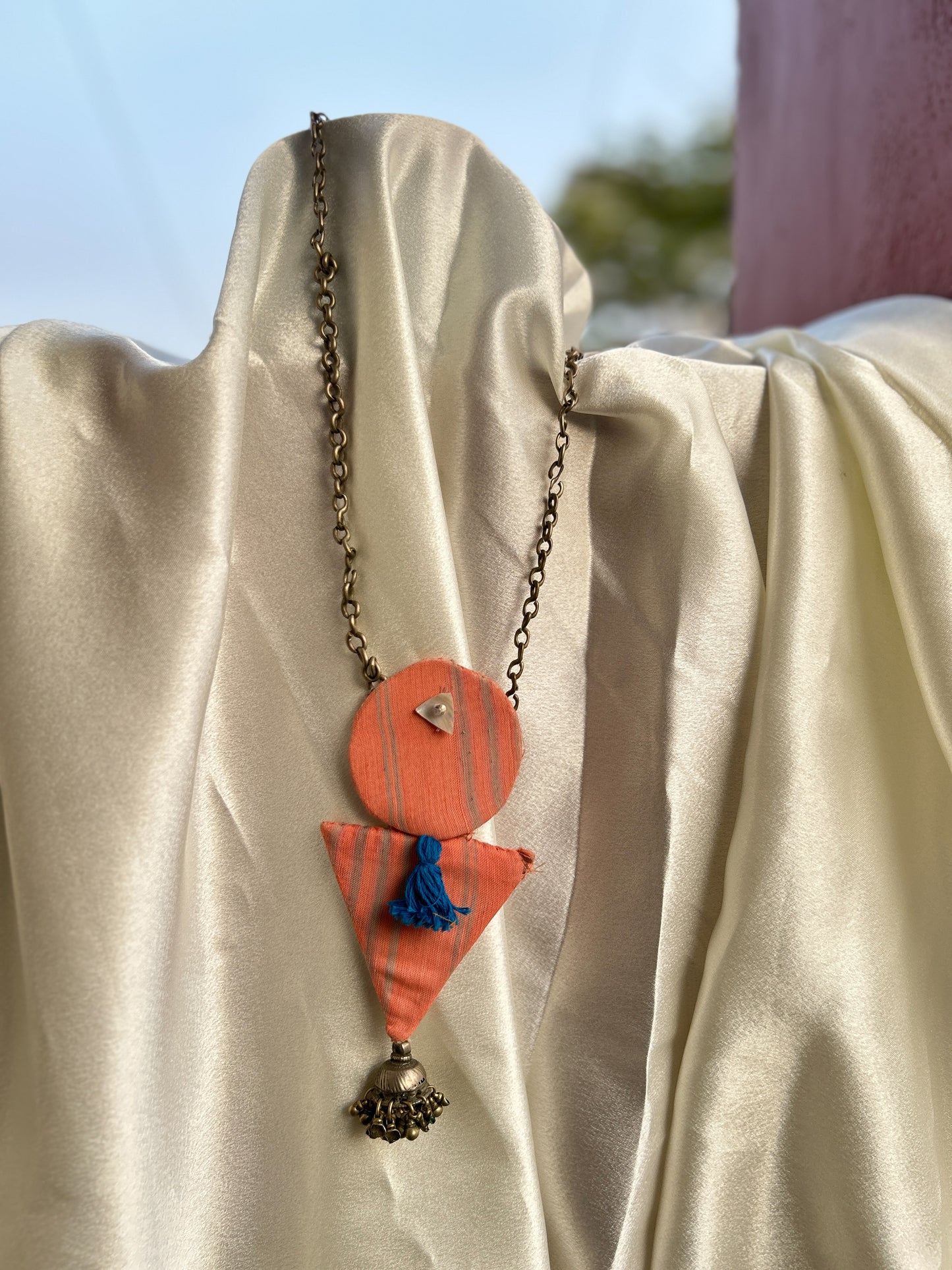 Aakar orange with blue tassle