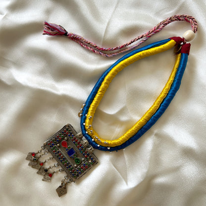 Square Afghan pendant with yellow & blue cord - necklace