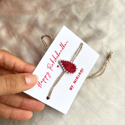 Tilak embroidered red rakhi