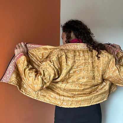 Dull yellow winter old saree jacket