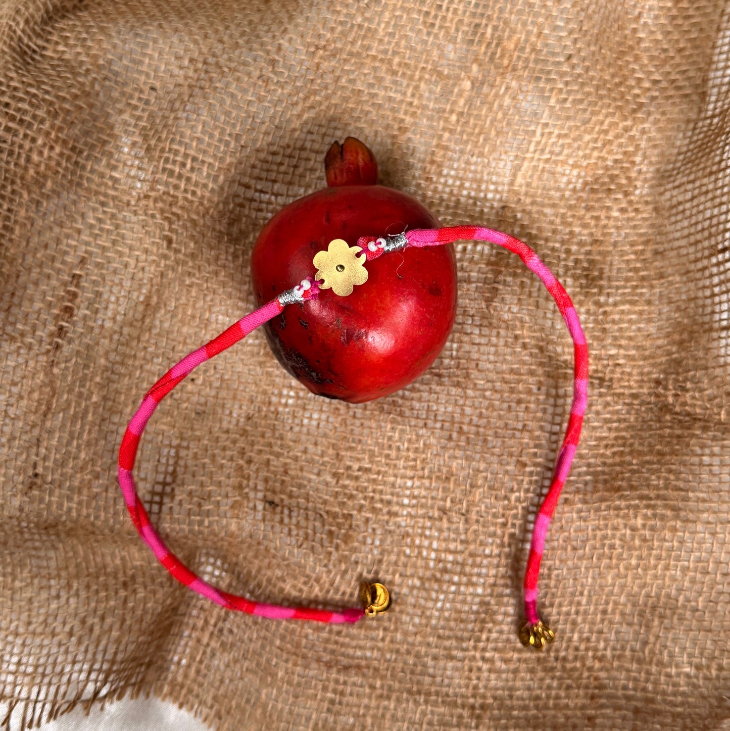 Flower brass rakhi
