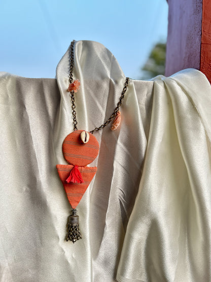 Aakar orange blush pink tassle necklace