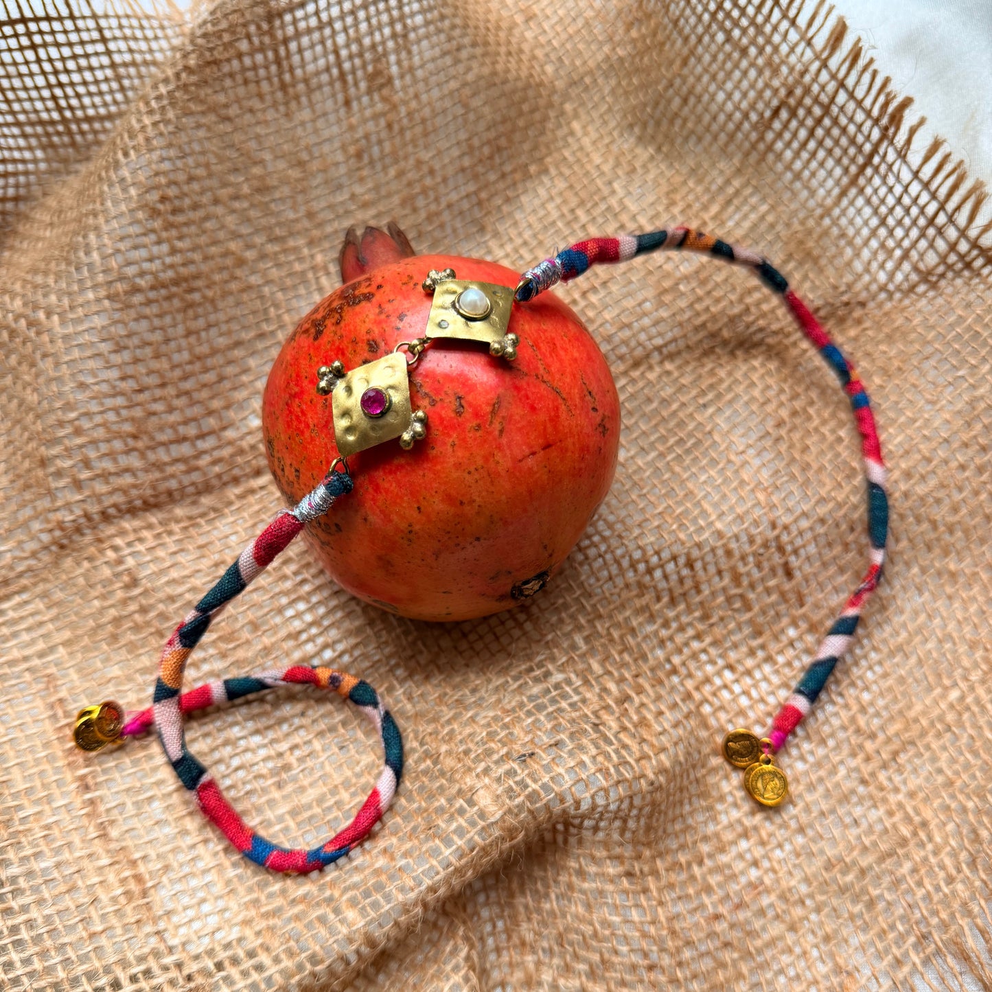 Rhombus brass rakhi