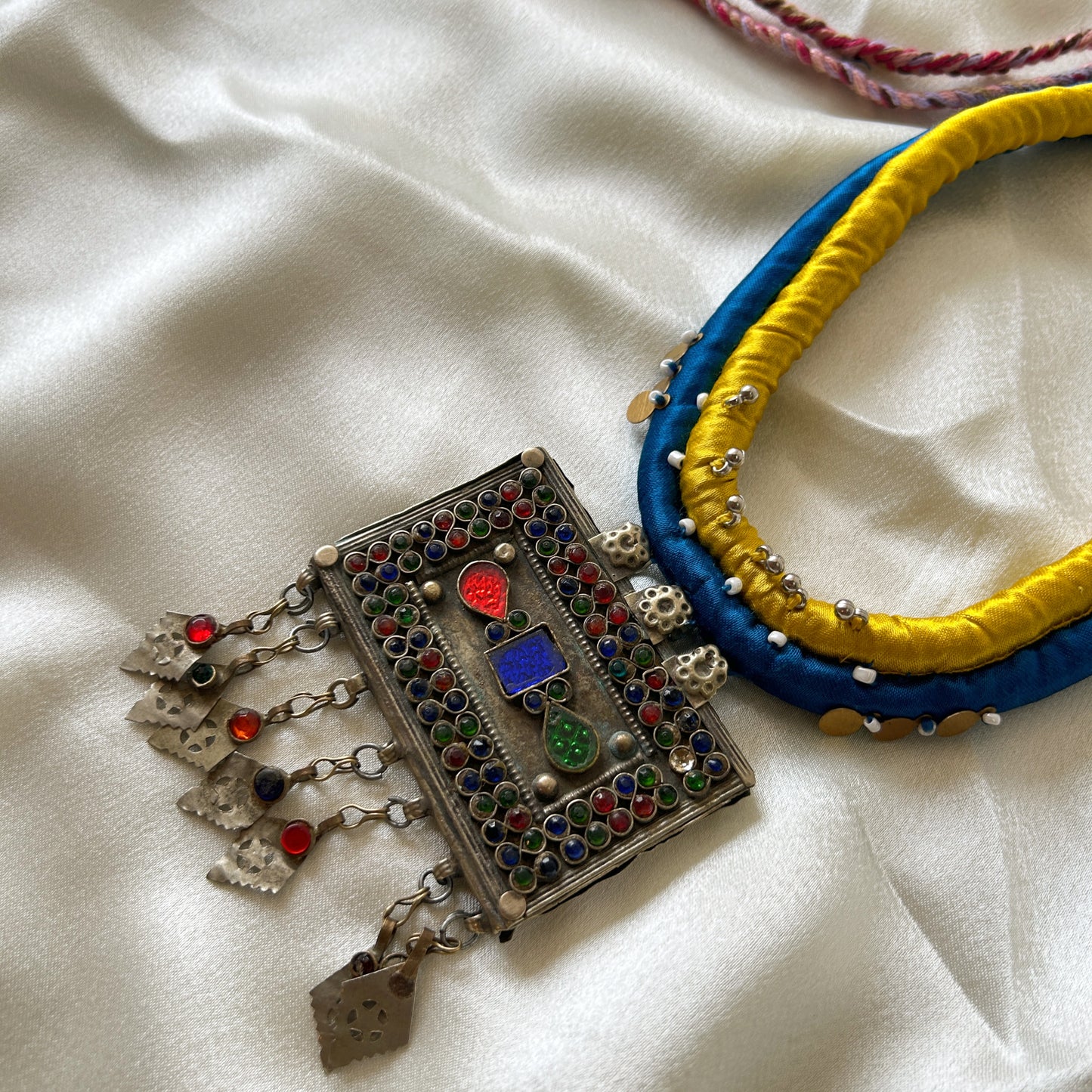 Square Afghan pendant with yellow & blue cord - necklace