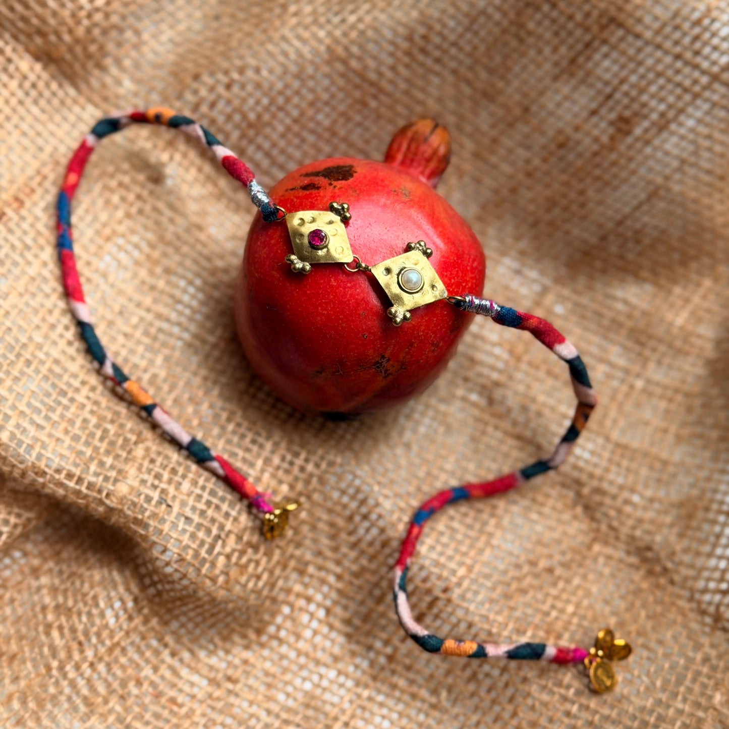 Rhombus brass rakhi