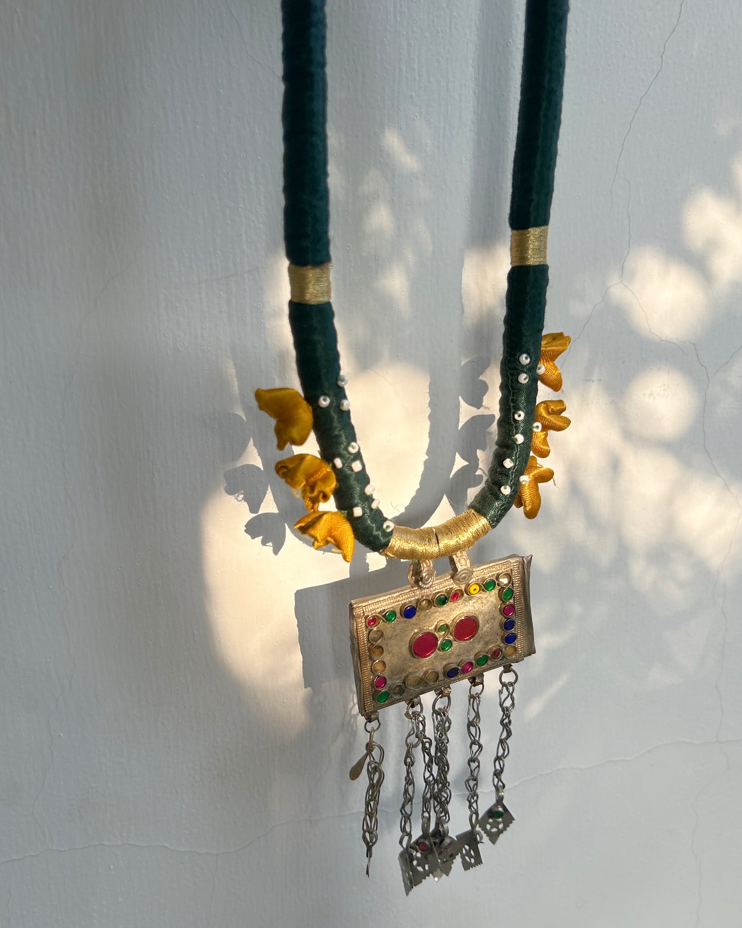 Square Afghan statement necklace - Green cord