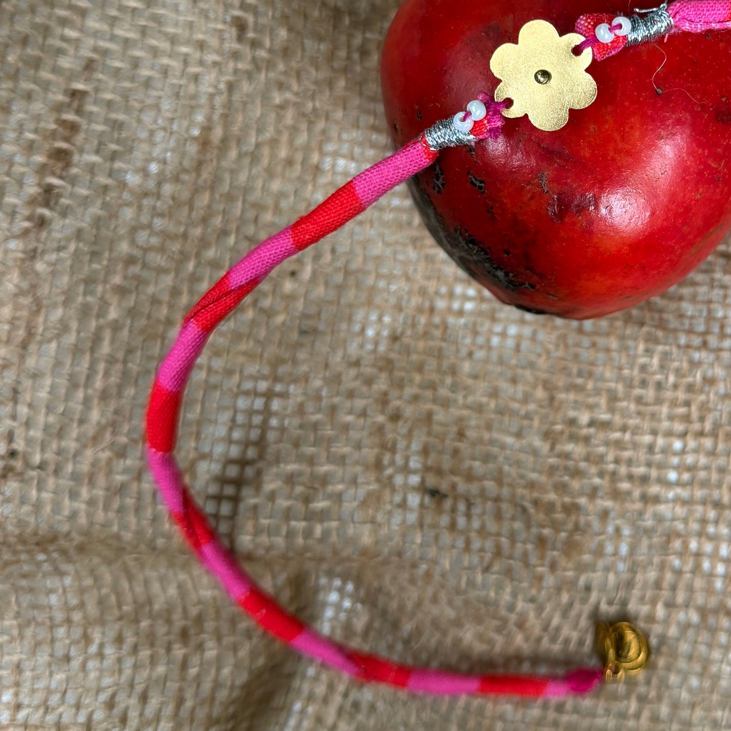 Flower brass rakhi