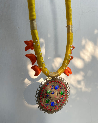 Circle Afghan statement necklace - yellow cord