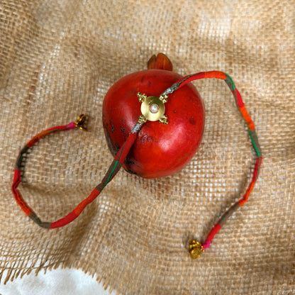 Pearl brass rakhi